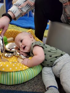 Child laying on soft materials